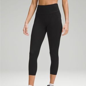 Fast and free high rise crop 23 inches